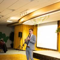 A clarinetist in the Grand River Room.